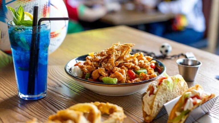 Brunch in Dubai Guide: Best Weekend Deals, Venues & Costs Brunch in Dubai guide showing a weekend brunch spread